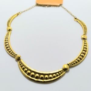 Gold tone bold metal style necklace